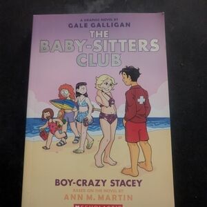 Scholastic Graphic Novel with Blue and Yellow Cover